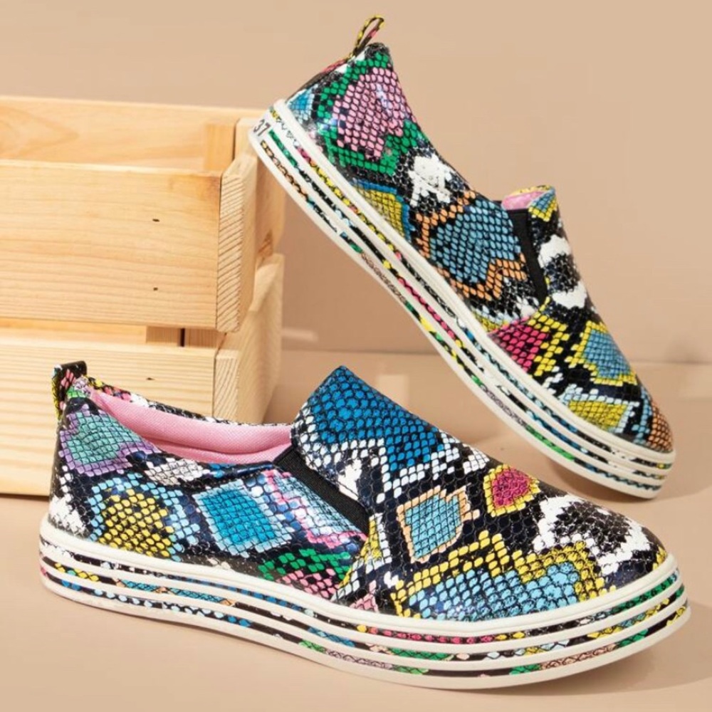 Snakeskin print slip on sneakers